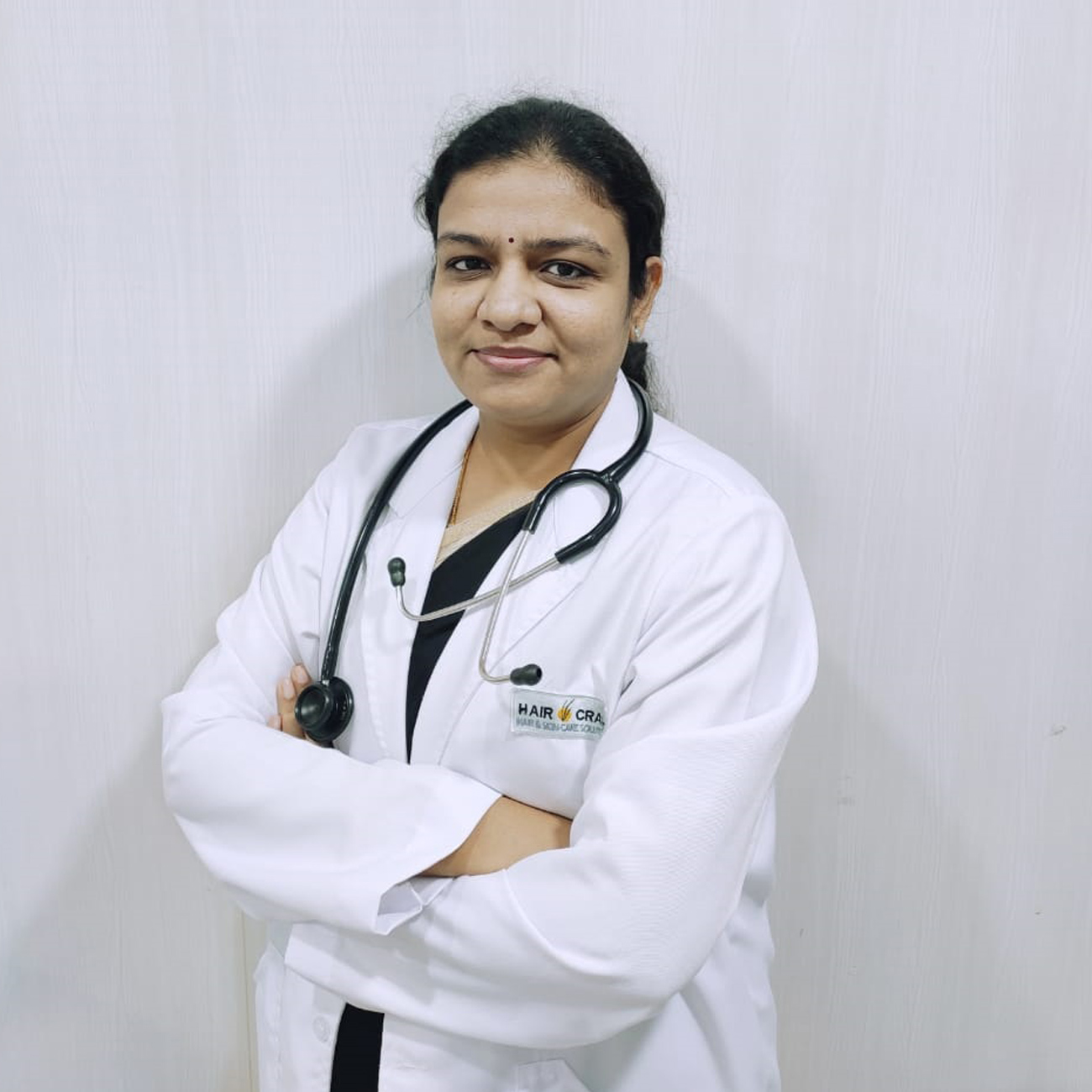 Dr. Ashok T